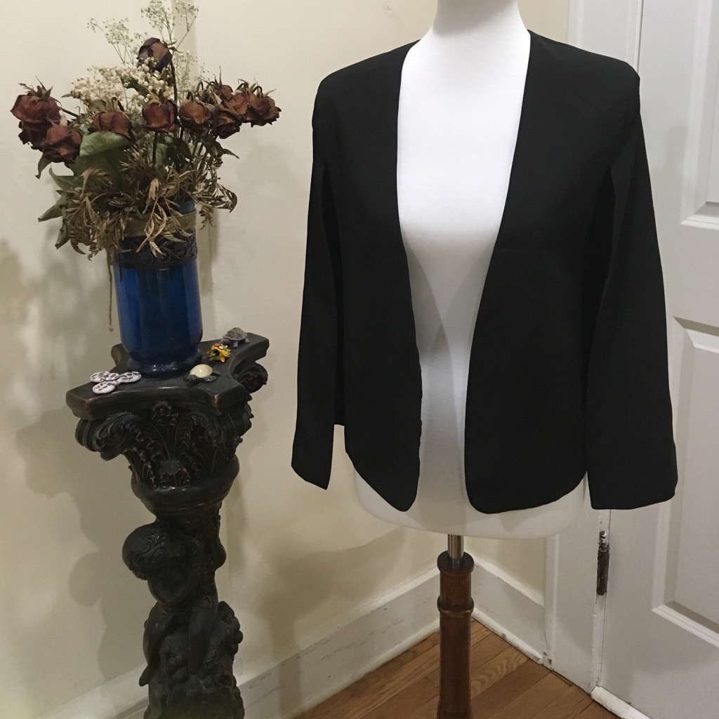 Black Jacket Solid Black Open Arms